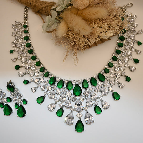 JANA- Clear crystal and emerald green coloured set in silver polish with earrings