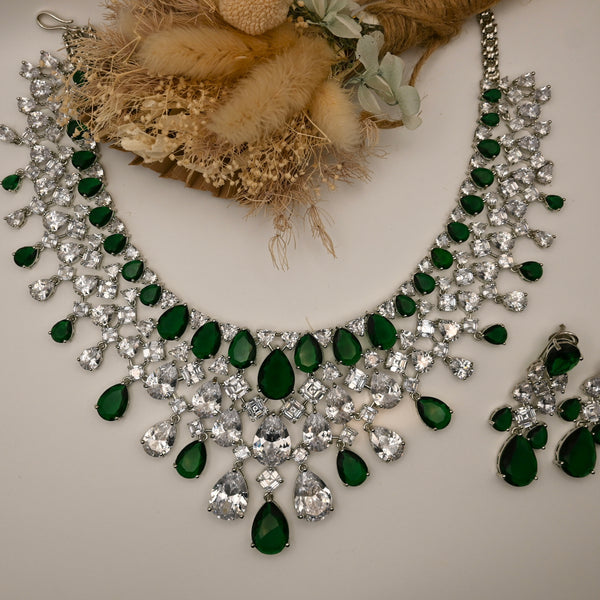 JANA- Clear crystal and emerald green coloured set in silver polish with earrings