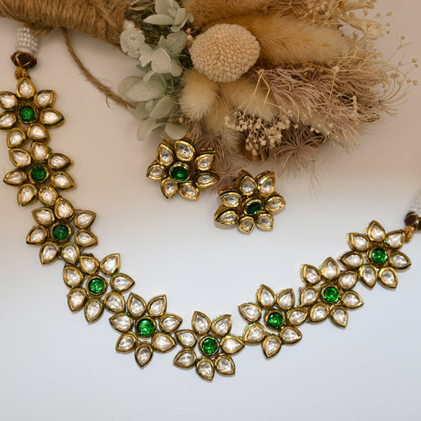 Shumi- kundan traditional green and clear stone floral shaped necklace with earrings