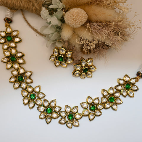 Shumi- kundan traditional green and clear stone floral shaped necklace with earrings