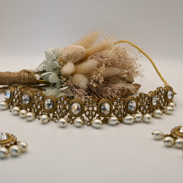 Rema- Ivory and white clear stone choker