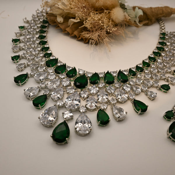 JANA- Clear crystal and emerald green coloured set in silver polish with earrings