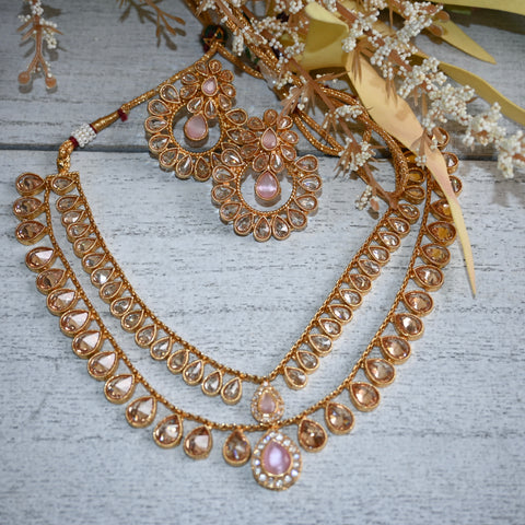 ARYANA ~ traditional yellow gold set with pastel pink AD gems