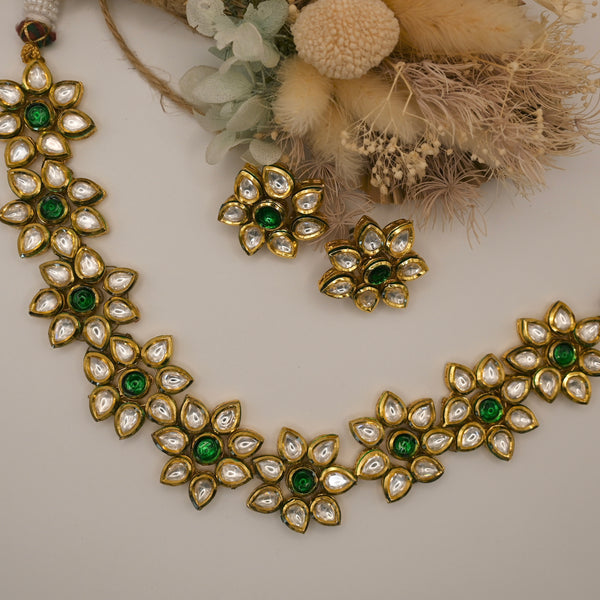 Shumi- kundan traditional green and clear stone floral shaped necklace with earrings