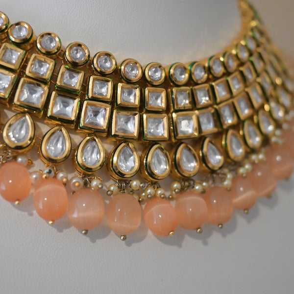 MUGHAL- monalisa stone and kundan heavy necklace and earring set in peach.