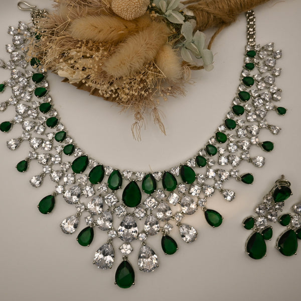 JANA- Clear crystal and emerald green coloured set in silver polish with earrings