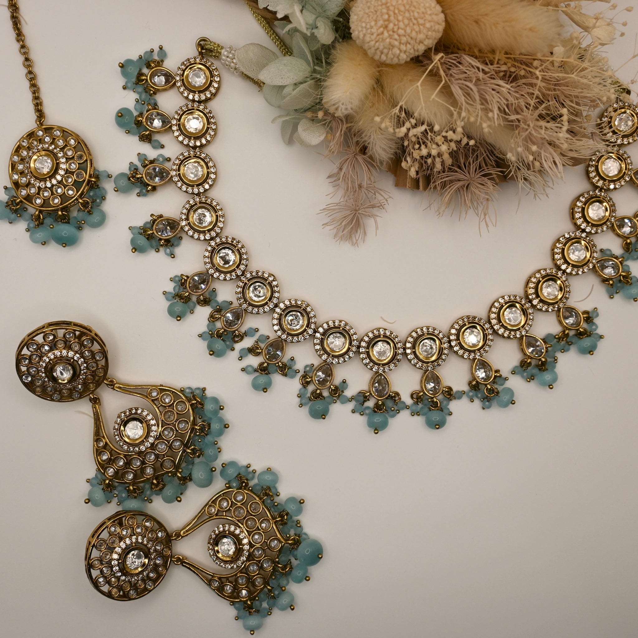 Alonseh- baby blue kundan and polki necklace set
