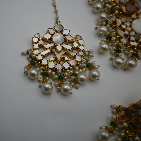LOUVE- gold plated mother of pearl semi precious necklace set with matching mangtika and earrings