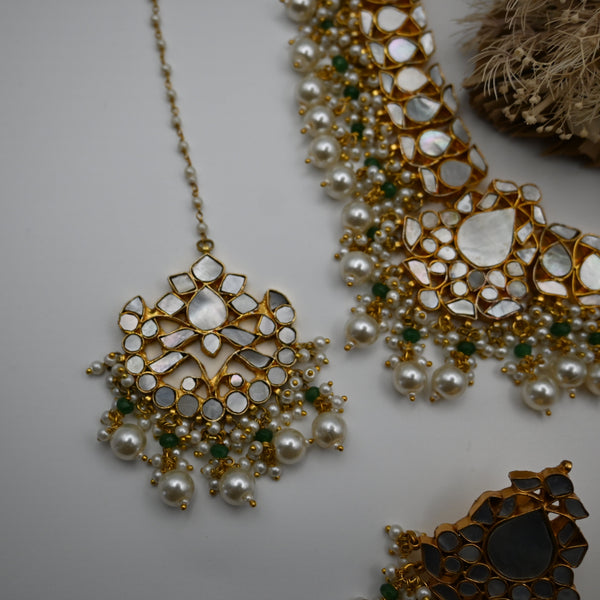 LOUVE- gold plated mother of pearl semi precious necklace set with matching mangtika and earrings