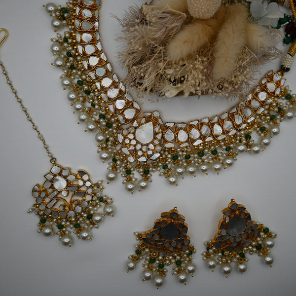 LOUVE- gold plated mother of pearl semi precious necklace set with matching mangtika and earrings