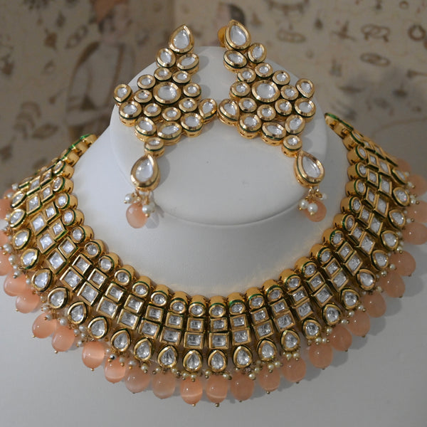 MUGHAL- monalisa stone and kundan heavy necklace and earring set in peach.